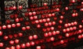 red votive candles inside the place of worship without people Royalty Free Stock Photo