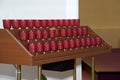 Red votive offertory candles in a catholic church Royalty Free Stock Photo