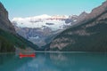 Red Voyageur Canoes on Lake Louise at Dawn Royalty Free Stock Photo