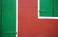 Red vs. Green: Door and Window in Detail Royalty Free Stock Photo