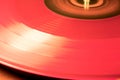 Red Vynil Disc is being played Royalty Free Stock Photo