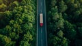 Red Wagon truck driving on the highway, aerial shot over forest Royalty Free Stock Photo