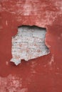 Red wall with hole Royalty Free Stock Photo