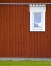 Red wall with toilet window Royalty Free Stock Photo