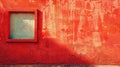 A red wall with a window and some graffiti on it, AI Royalty Free Stock Photo