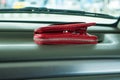 Red wallet left on dashboard of car. Royalty Free Stock Photo