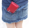 Red wallet in the pocket Royalty Free Stock Photo