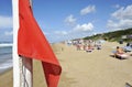 A red warning flag on the beautiful beaches of the tyrrenian sea.