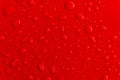 Red water droplet on the roof of car Royalty Free Stock Photo