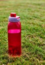 Red water bootle on the grass