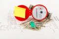 Red water meter with cash and keys on draft Royalty Free Stock Photo