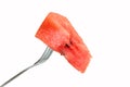 Red watermelon impaled on a fork Royalty Free Stock Photo