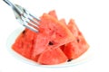 Red watermelon impaled on a fork Royalty Free Stock Photo