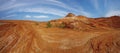 Red wavy sand stones, bluffs and cliifs at Glen Canyon National Recriation Area, Page, Arizona. Panorama Royalty Free Stock Photo