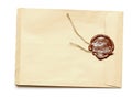 Red wax seal on yellow envelope
