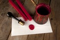 Red wax staff with stamp and letter