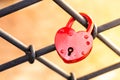 Red wedding lock on a fence Royalty Free Stock Photo