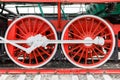 Red wheel and detail of mechanism a vintage russian steam train locomotive Royalty Free Stock Photo