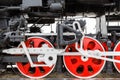 Red wheel and detail of mechanism a vintage russian steam train locomotive Royalty Free Stock Photo