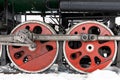 Red wheel and detail of mechanism a vintage russian steam train locomotive Royalty Free Stock Photo