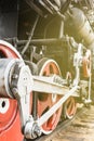 Red wheel and detail of mechanism a vintage russian steam train locomotive Royalty Free Stock Photo