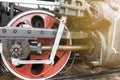 Red wheel and detail of mechanism a vintage russian steam train locomotive Royalty Free Stock Photo