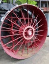 Red wheel of an old steam-powered tractor Royalty Free Stock Photo