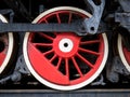 Red wheels of the black locomotive Royalty Free Stock Photo