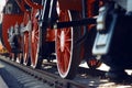 The red wheels of an old vintage steam locomotive Royalty Free Stock Photo