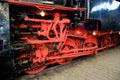 Red wheels of steam train. Royalty Free Stock Photo