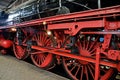 Red wheels of steam train. Royalty Free Stock Photo