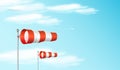 Windsock on the blue sky. Red and white airport wind flag showing wind direction and speed. Realistic illustration. Royalty Free Stock Photo