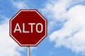 Red and white Alto stop sign