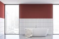 Red and white bathroom interior with bathtub Royalty Free Stock Photo