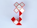 red and white bicolor magic snake Transformable twist puzzle in shape of flower Royalty Free Stock Photo