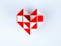 red and white bicolor magic snake twist puzzle in shape of heart isolated Royalty Free Stock Photo