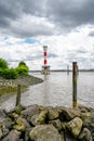 Red and white Blankenese lighthouse near Hamburg. Historic lighthouse on the Elbe