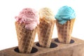 Three Red White and Blue Ice Cream Cones in a Row on a White Background Royalty Free Stock Photo