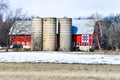 Red, White and Blue Quilt Barn with Silos Royalty Free Stock Photo