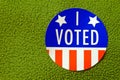 red, white and blue round, circular with two stars I voted sticker