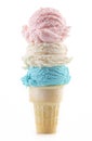 Red White and Blue Scoops of Ice Cream on a Cone on a White Background Royalty Free Stock Photo