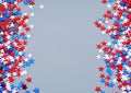 Red white blue shiny confetti stars on grey background, tricolor concept, independence and freedom day USA Royalty Free Stock Photo