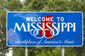 Red, white, and blue sign to welcome travelers to Mississippi -