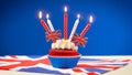 Red white and blue theme cupcakes and cake stand with UK Union Jack flags