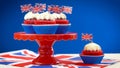 Red white and blue theme cupcakes and cake stand with UK Union Jack flags