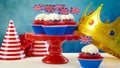 Red white and blue theme cupcakes and crown with UK Union Jack flags