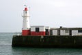 Red and white breakwater lighthouse Royalty Free Stock Photo