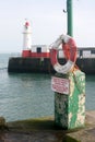 Red and white breakwater lighthouse Royalty Free Stock Photo