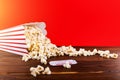 Red and White Bucket Of Popcorn With Two Red Movie Tickets Royalty Free Stock Photo