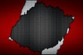 Red and white carbon fiber tear on the black metallic mesh. Royalty Free Stock Photo